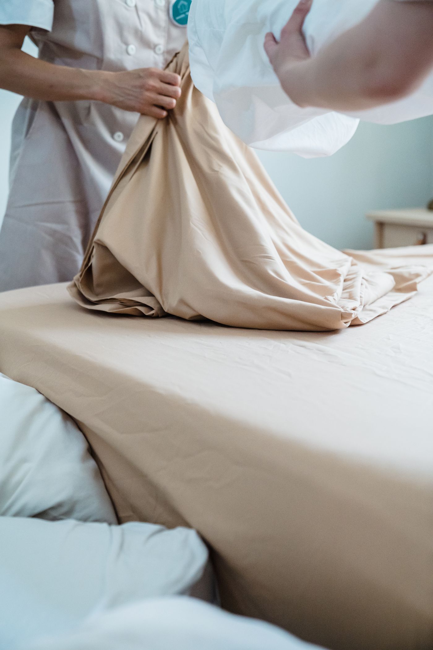 Crisp hotel-style bed with fresh white linens in a vacation rental